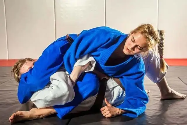 students practicing different types of martial arts lessons